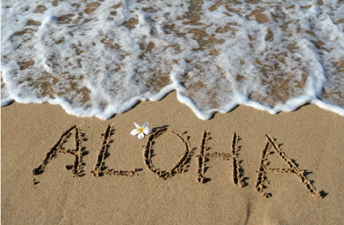 aloha written on beach, hawaii